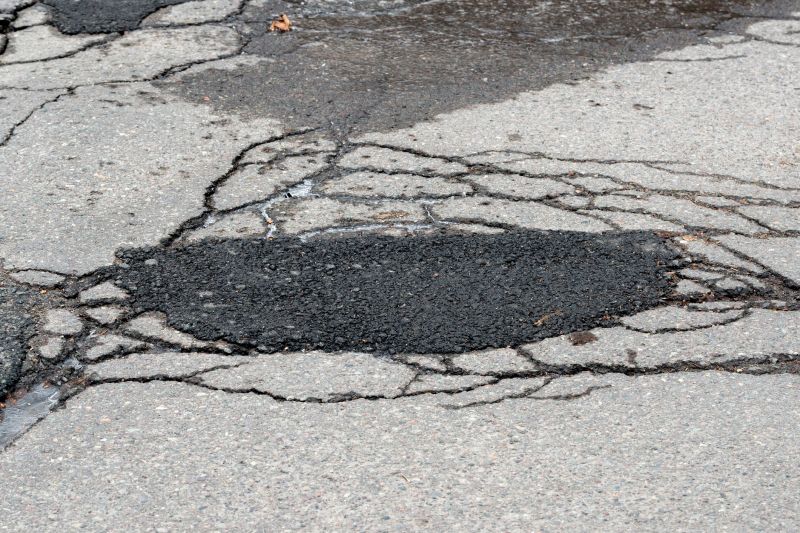 How Weather Conditions Affect Asphalt Cracks And Potholes